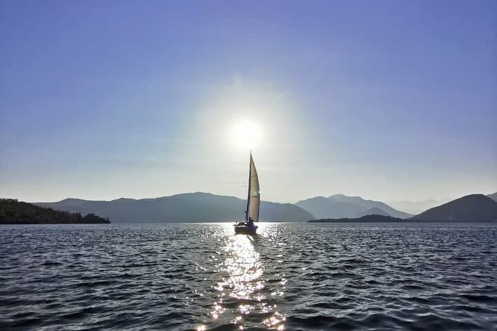 Private Tour on a Sailing Boat on Lake Maggiore with Aperitif and Music