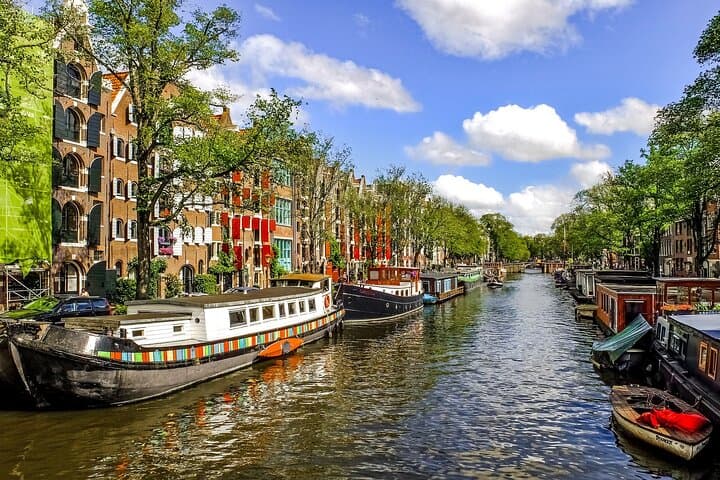 From Brussels to Amsterdam: Day Trip w/ Cheese, Clogs & Windmills