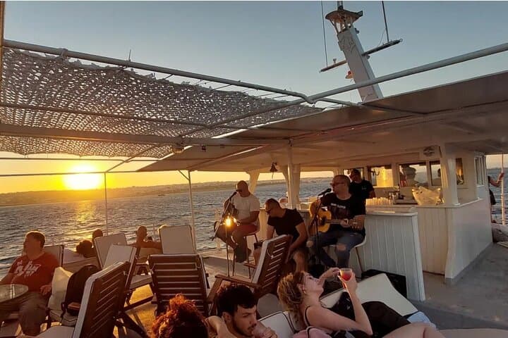 Rhodes Sunset Cruise: Swim, Greek Dinner, Wine & Live Music