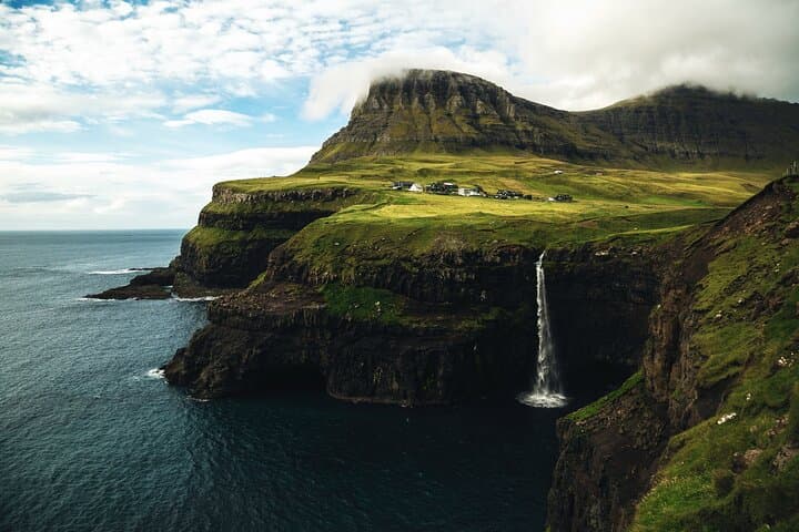 Full Day Vágar Island Tour Including Slave Cliff Hike
